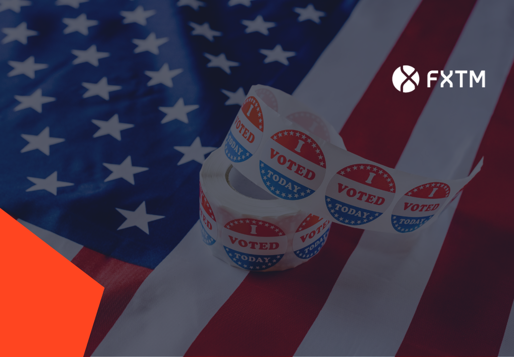 reel of i voted badges on an american flag